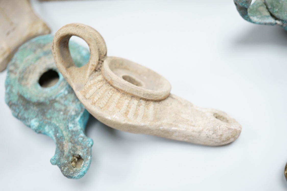 A pair of Turkish bath shoes, a collection of African beads and Middle Eastern vessels etc.